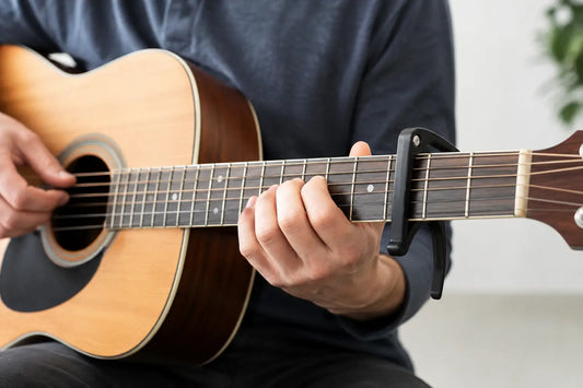 How to Use a Guitar Capo for Better Songs